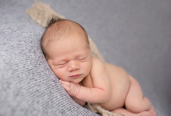 Newborn Baby Sleeping on Blanket