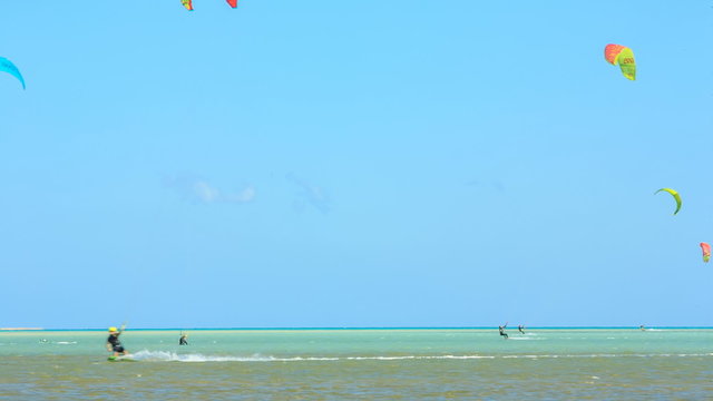 People engaged in kite surfing in the Kite Village at the Red Sea near Hamata Marine.