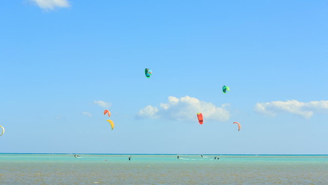People engaged in kite surfing in the Kite Village at the Red Sea near Hamata Marine.