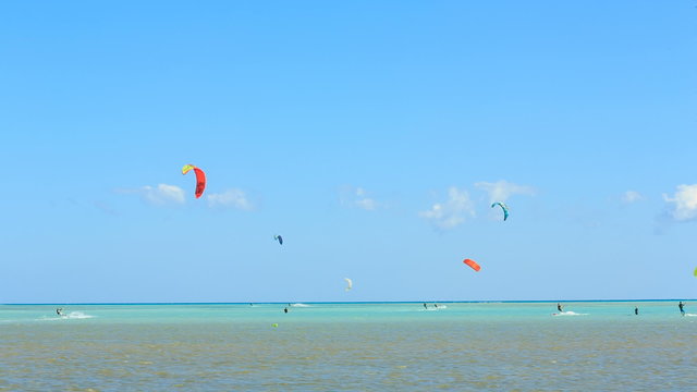 People engaged in kite surfing in the Kite Village at the Red Sea near Hamata Marine.