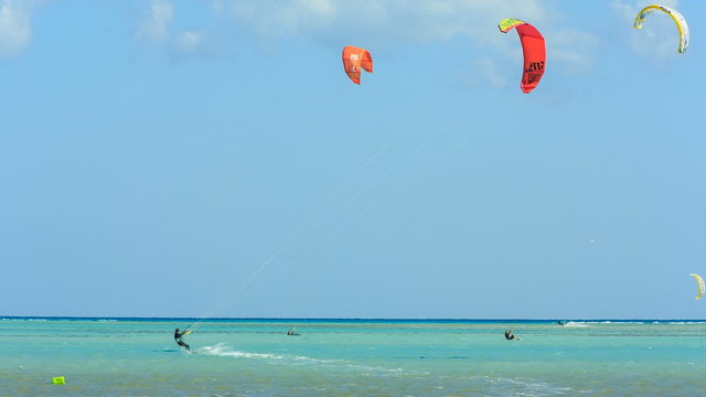 People engaged in kite surfing in the Kite Village at the Red Sea near Hamata Marine.