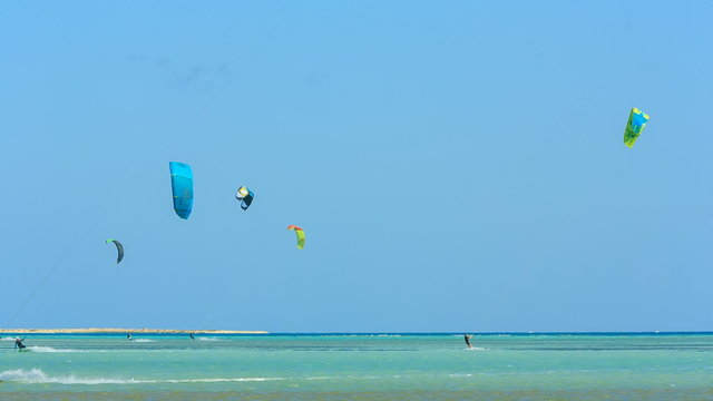 People engaged in kite surfing in the Kite Village at the Red Sea near Hamata Marine.