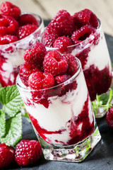 Raspberry ice cream, berries and mint, selective focus