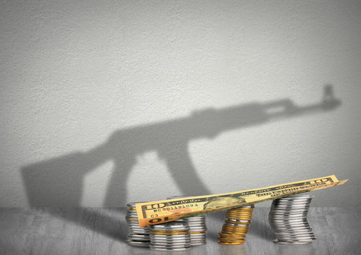 financing war concept, money with weapon shadow