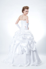 Fototapeta na wymiar young beautiful bride in wedding dress