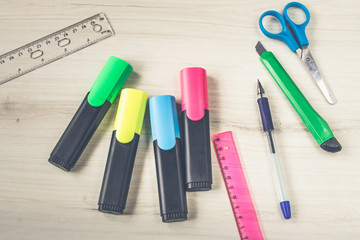 stationery on wooden background