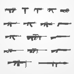 Set of gun and weapon icons in silhouette style. Guns, machine guns, shotguns and rifles. Guns stock vector image.