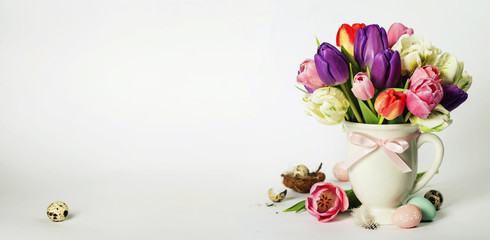 Beautiful tulips bouquet and easter eggs