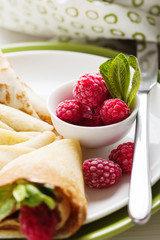 Pancakes with fresh raspberry