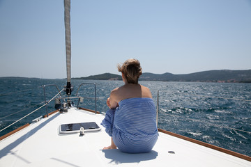 Young woman Sailing On Yacht 