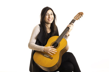 Obraz premium portrait of pretty woman playing guitar