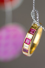 gold ring with square diamond ruby