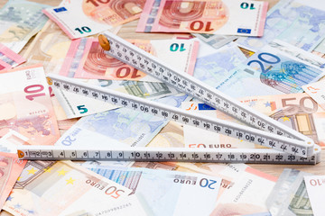Ruler on a background of money