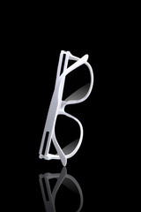 sunglasses on black background
