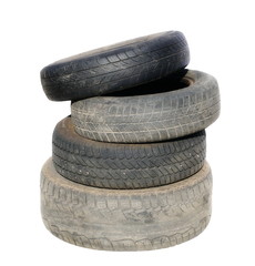 Old tires stacked, isolated on white background
