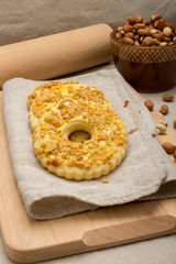 Homemade cakes with crushed peanuts on linen napkin