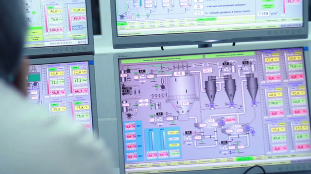 Computer system monitors the production management at the plant/Automated production line/Computer equipment at modern dairy factory