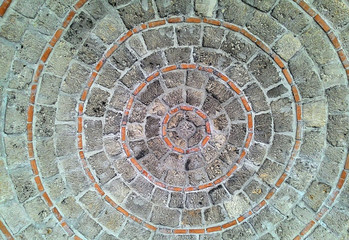 Paver bricks arranged in a circular pattern