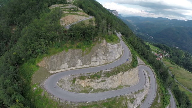 Heli aerial landscape shoot from above of mountain winding road
