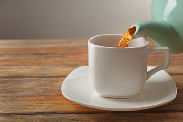 Cup of tea on wooden table