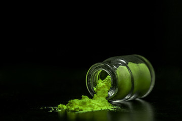green colorant powder in the jar - obrazy, fototapety, plakaty