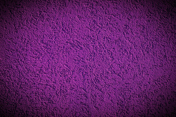Purple concrete texture background with vignette