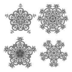 Set of vector monochrome flower mandala on a contrasting background. Snowflake