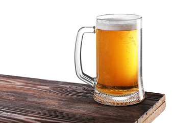 Glass of beer on white background