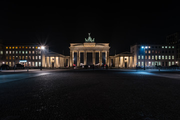 Fototapeta na wymiar The Brandenburg Gate is an 18th-century neoclassical triumphal arch in Berlin, Germany. Night illumination.