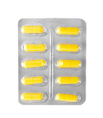 Yellow pills in the blister pack, isolated on white