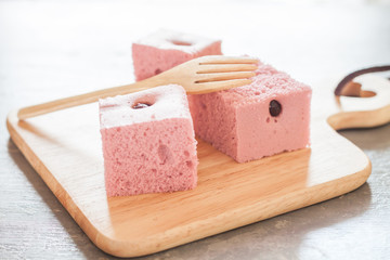 Steamed cake on wooden plate