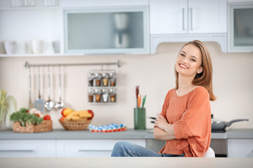 Young woman in the kitchen