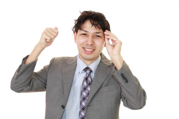 ヘアーセットに満足する男性