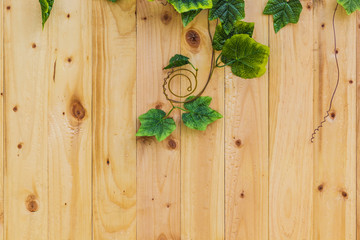 A photo of Wood board with green leaf