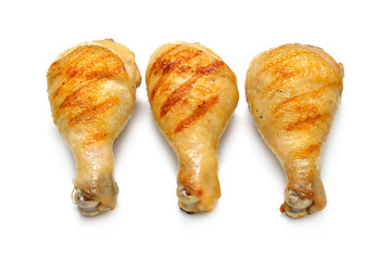Grilled chicken legs isolated on white background