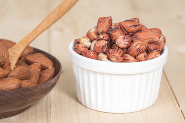 Tiger peanut in bowl on wood table