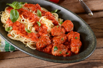 Spaghetti pasta with meat balls and tomato suace
