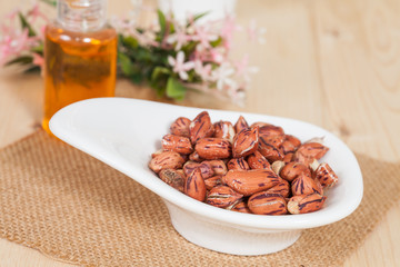 Tiger peanut in bowl on wood table