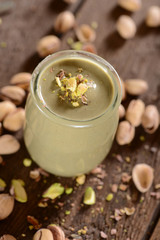 Fresh pistachios cream in small jar