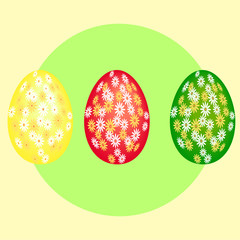 три крашенных яйца на фоне зеленого круга