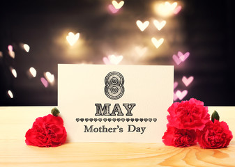 Mothers Day message card with carnation flowers