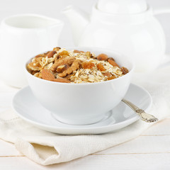 Oatmeal flakes with nuts in bowl