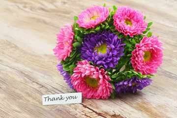 Thank you card with colorful daisy flower bouquet
