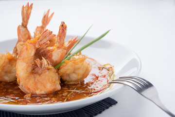 sweet and sour sauce with prawn, isolated background