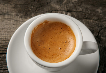 Coffee cup with foam on top view