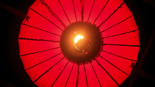 Closeup Upper View Red Chinese Lantern against Darkness