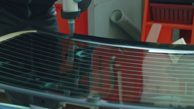 Gluing all edges of the back window 
