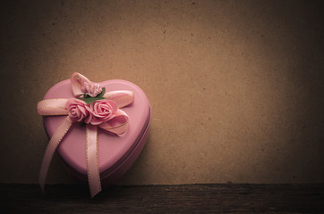 Pink heart shape box on table,still life.