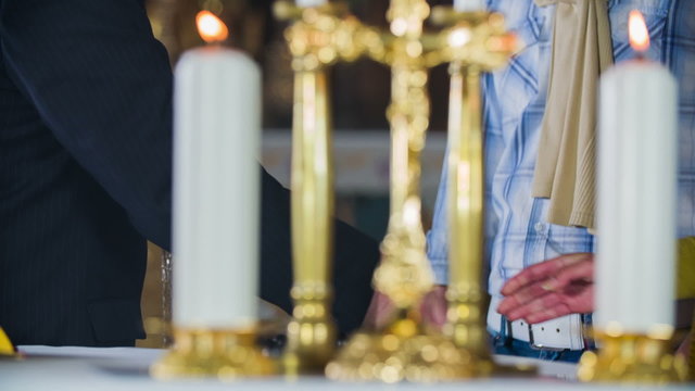 Shaking hands with a priest