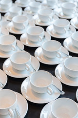 Preparing the new sets of coffee cup for conference breaking tim